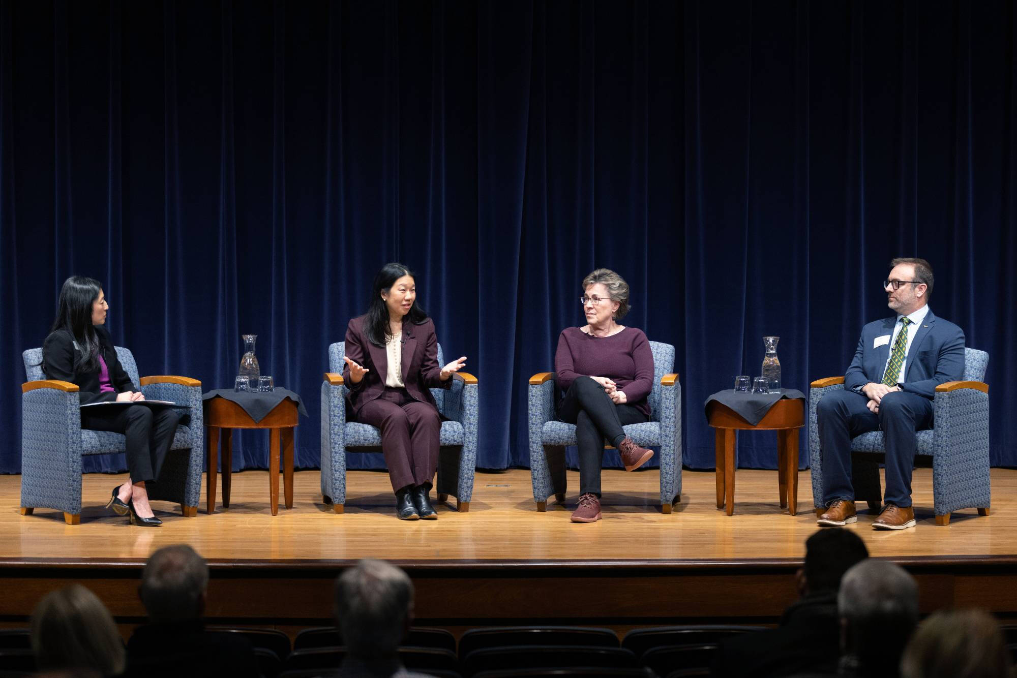 Speakers onstage during addressing affordabiity event